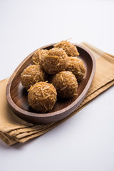 Jaggery coconut Laddoo / Nariyal gur ke laddu, indian sweet food for festivals like rakshabandhan/rakhi pournima