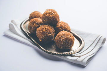 Jaggery coconut Laddoo / Nariyal gur ke laddu, indian sweet food for festivals like rakshabandhan/rakhi pournima