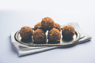 Jaggery coconut Laddoo / Nariyal gur ke laddu, indian sweet food for festivals like rakshabandhan/rakhi pournima