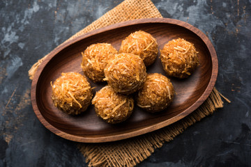 Jaggery coconut Laddoo / Nariyal gur ke laddu, indian sweet food for festivals like rakshabandhan/rakhi pournima