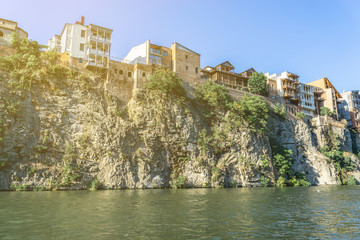 View of the old city of Tbilisi from the water, Kura River © Nbaturo