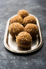 Jaggery coconut Laddoo / Nariyal gur ke laddu, indian sweet food for festivals like rakshabandhan/rakhi pournima
