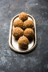 Jaggery coconut Laddoo / Nariyal gur ke laddu, indian sweet food for festivals like rakshabandhan/rakhi pournima