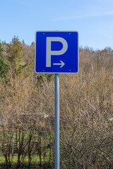 A parking sign in nature