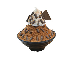 Korean shaved ice dessert with sweet toppings, Chocolate bingsu or ice snow flake with fresh milk and whipping cream in korea style on cup with clipping path.