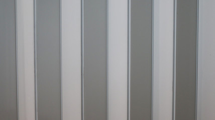 White plastic wall in the room.