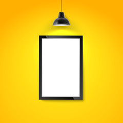 Picture frame on yellow wall with hanging lamp. Blank photo frame or poster template. Photo art gallery mockup.