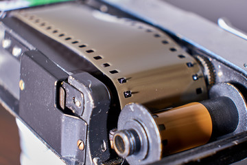 Old vintage film camera close up isolated