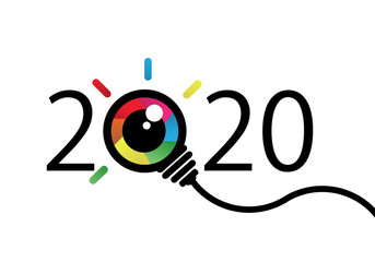 Naklejka premium happy new year 2020. 2020 with Colorful eye bulb sign. Vision and idea
