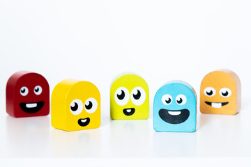 happy colorful wooden smiley characters 
