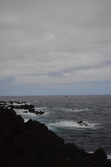 Fototapeta na wymiar Ocean meet rocks in Porto Moniz