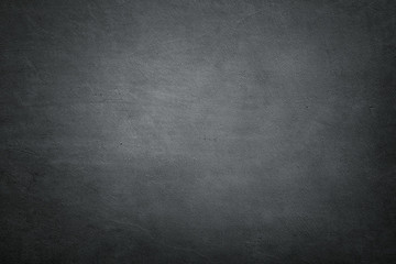 Dark empty concrete wall background with copy space