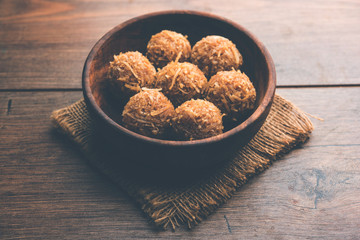 Jaggery coconut Laddoo / Nariyal gur ke laddu, indian sweet food for festivals like rakshabandhan/rakhi pournima