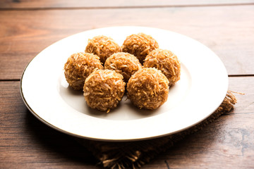 Jaggery coconut Laddoo / Nariyal gur ke laddu, indian sweet food for festivals like rakshabandhan/rakhi pournima