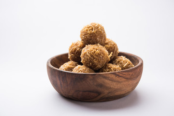 Jaggery coconut Laddoo / Nariyal gur ke laddu, indian sweet food for festivals like rakshabandhan/rakhi pournima