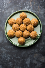 Jaggery coconut Laddoo / Nariyal gur ke laddu, indian sweet food for festivals like rakshabandhan/rakhi pournima