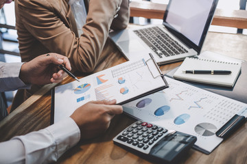 Business team working with new startup project plan and discussion information for financial...