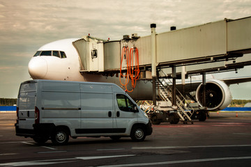 Teletrap connected to the aircraft. The telescopic ladder is connected to aircraft. Boarding and disembarking passengers from an airplane. The sleeve is connected to the aircraft.