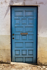 Blue door with mailbox