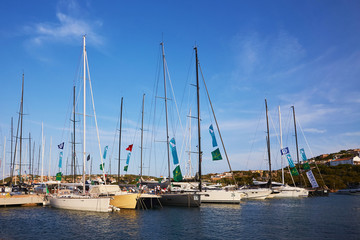 Fototapeta premium Porto Cervo, Italy - September 1, 2019. Participants in the Maxi Yacht , Cup boat race in port