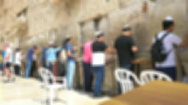 JERUSALEM, ISRAEL.  Jewish men praying at the Western wall in Jerusalem