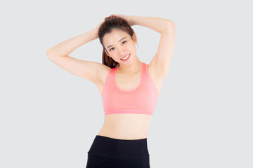 Fototapeta na wymiar Beautiful portrait young asian woman standing workout stretch muscle arm with healthy isolated on white background, asia girl wear sport clothes exercise and yoga for health, wellness concept.