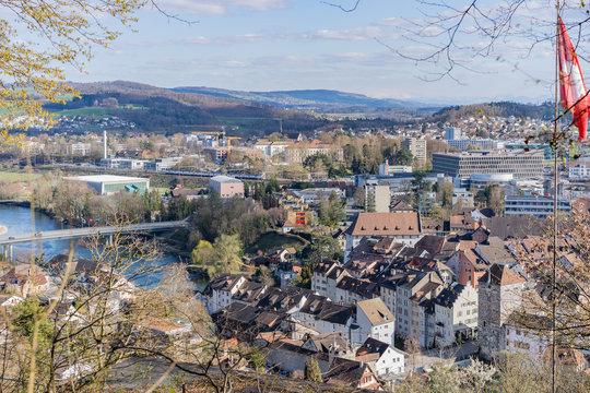 City view of Brugg Ost with Aare river, ancient town and Salzhaus. Aerial panoramic view.