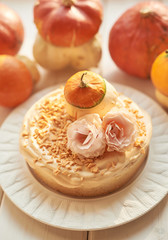 Naked Cake with Apples. Thanksgiving Day table. Happy Halloween Pumpkins, apples and flowers. Bright autumn background. Colorful autumn card. Autumn flower arrangement. Autumn bouquet