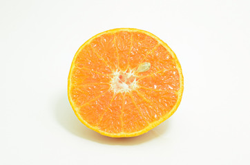 Sliced orange on a white background, fruit with one seed, Orange fruit.