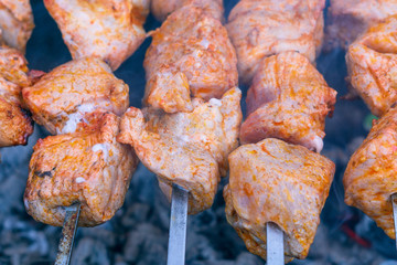 Pork roasted over the coals closeup