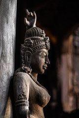 Naklejka na ściany i meble god goddess wood sculpture statue, exterior architecture, Sanctuary of Truth, Thailand