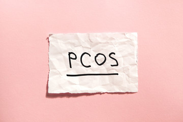PCOS - Polycystic ovary syndrome, woman sickness lettering on pink
