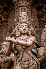 god goddess wood sculpture statue, exterior architecture, Sanctuary of Truth, Thailand