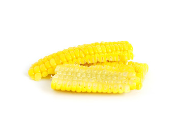 Yellow boiled corn seeds isolated on white background.