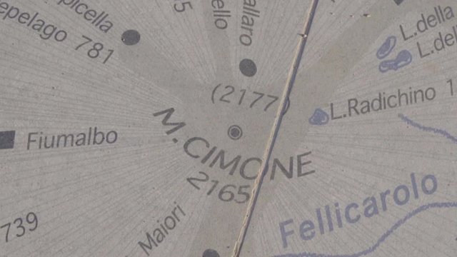 cimone mountain stone map on the top of the mountain 2019 sign 