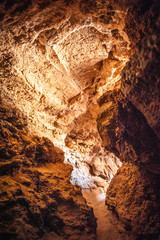 Detail of rocks in canyon Mayor at Valle de la Luna Moon Valley, San Pedro de Atacama Chile. Wide view of stunning sun rise on sand formation in world famous Atacama desert Chile. Salt formations at V