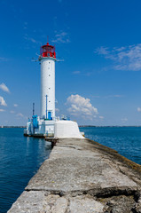 Seascape with lighthouse on the Black Sea in Odesa during the summer season