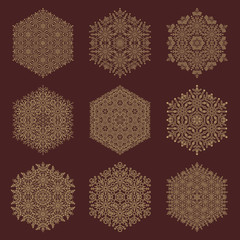 Set of vector snowflakes. Fine winter ornaments. Golden snowflakes collection. Snowflakes for backgrounds and designs