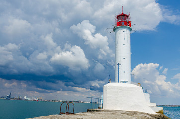 Fototapeta premium Seascape with lighthouse on the Black Sea in Odesa during the summer season
