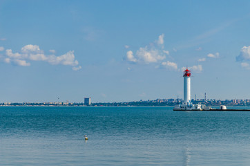 Seascape with lighthouse on the Black Sea in Odesa during the summer season