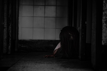 Portrait of asian woman make up ghost face with blood,Horror scene,Scary background,Halloween...