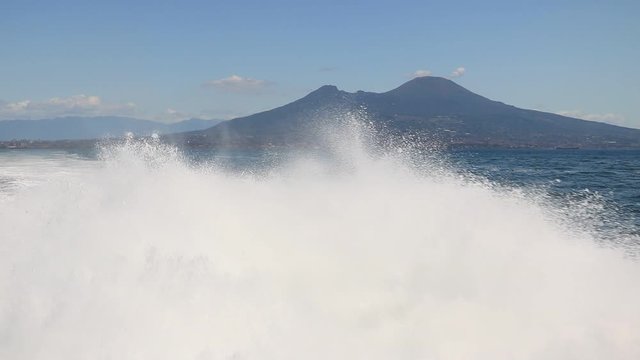 Wake of a hydrofoil in the Gulf of Naples. Mediterranean sea. A white foam made from the speed of the ship.
