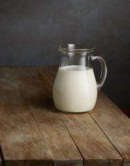 milk jug on wooden table
