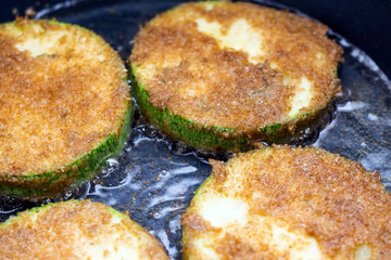 fried zucchini close up breaded