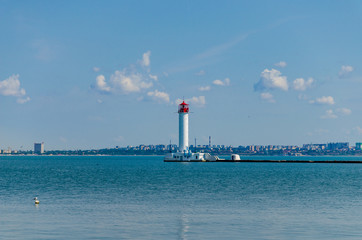 Seascape with lighthouse on the Black Sea in Odesa during the summer season