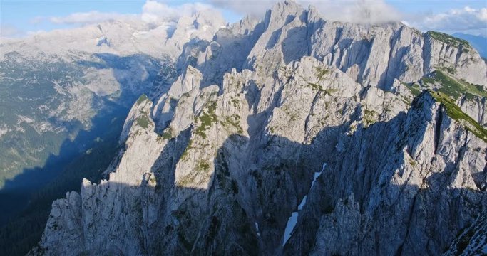 Dachstein mountain and Hallstatter Glacier in Austria - view from Donnerkogel ridge and via ferrata. Tilt up.