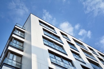 Modern and new apartment building. Multistoried modern, new and stylish living block of flats.