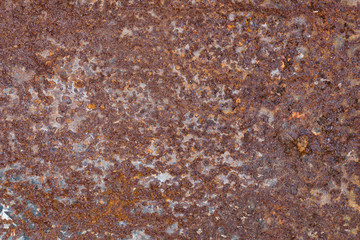 Brown metal surface covered with rust as background