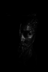 Obraz premium Black dark Latex Mask over Face