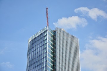 modern office building with reflection in windows